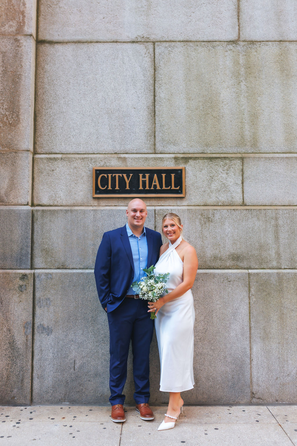 Couple outside Chicago City Hall on their elopement day
