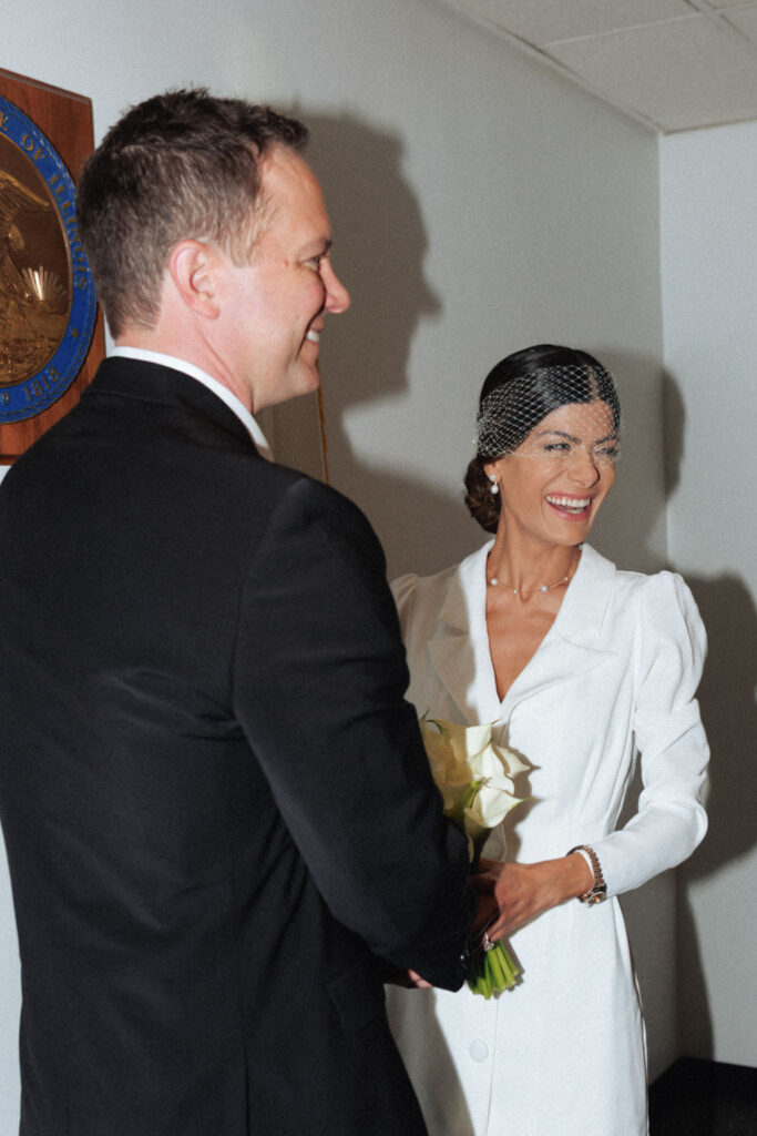Couple inside Chicago City Hall on their elopement day.