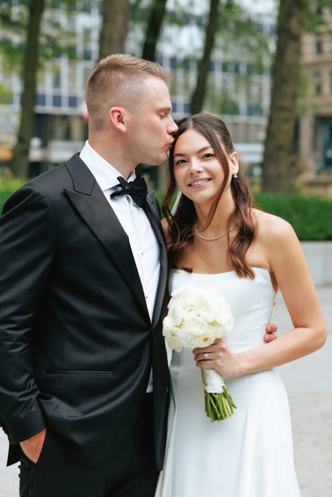 Wedding portraits inside the Art Institute of Chicago during a rainy, intimate Chicago wedding