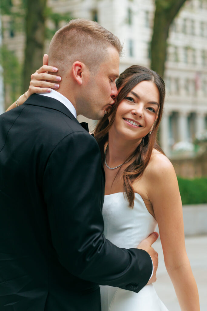 Wedding portraits inside the Art Institute of Chicago during a rainy, intimate Chicago wedding