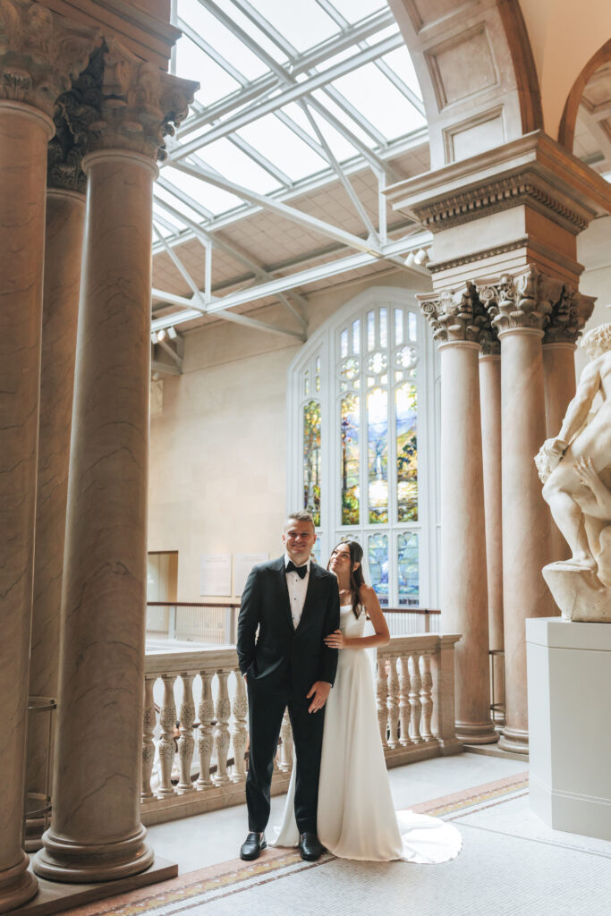Wedding portraits inside the Art Institute of Chicago during a rainy, intimate Chicago wedding