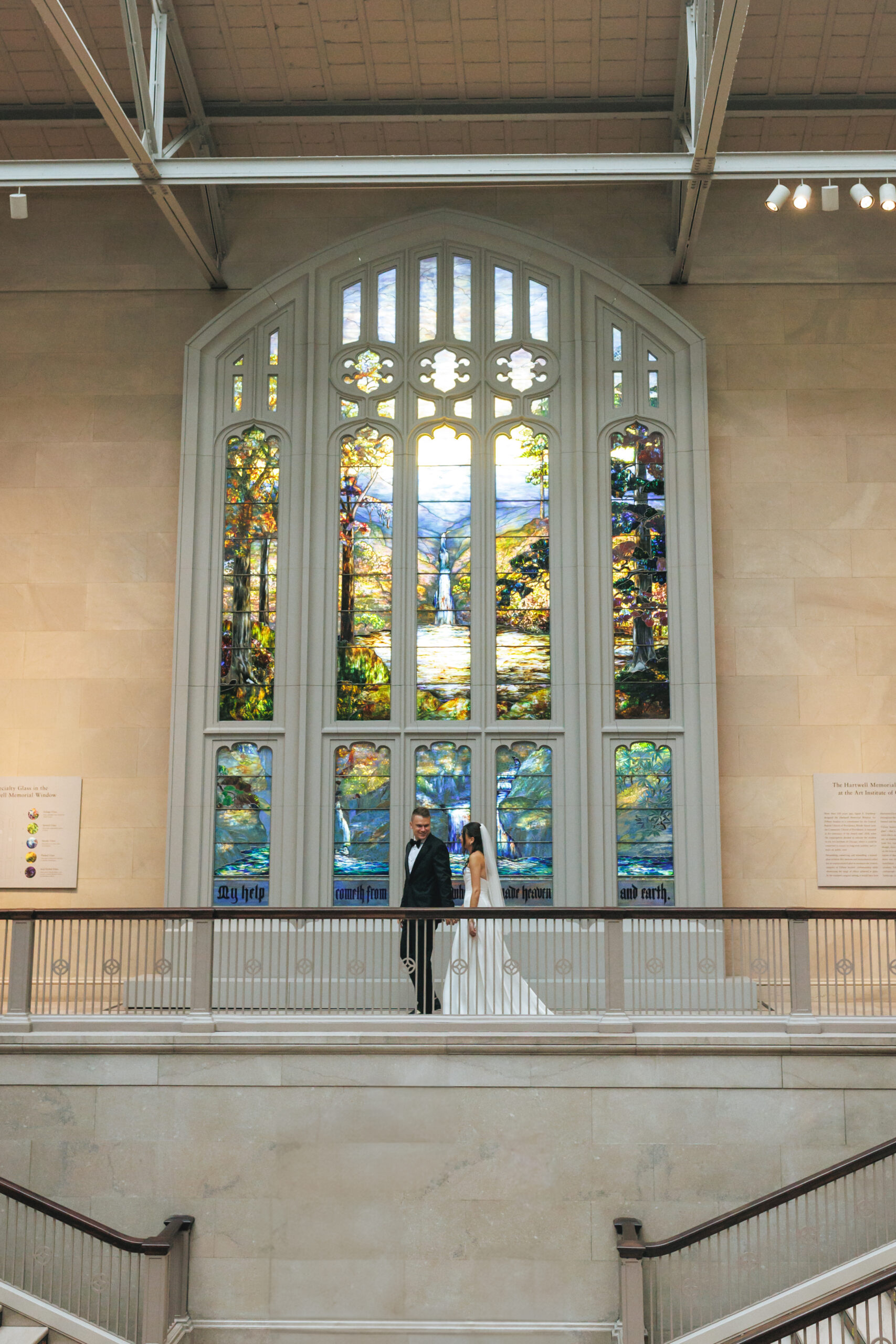 Wedding portraits inside the Art Institute of Chicago during a rainy, intimate Chicago wedding