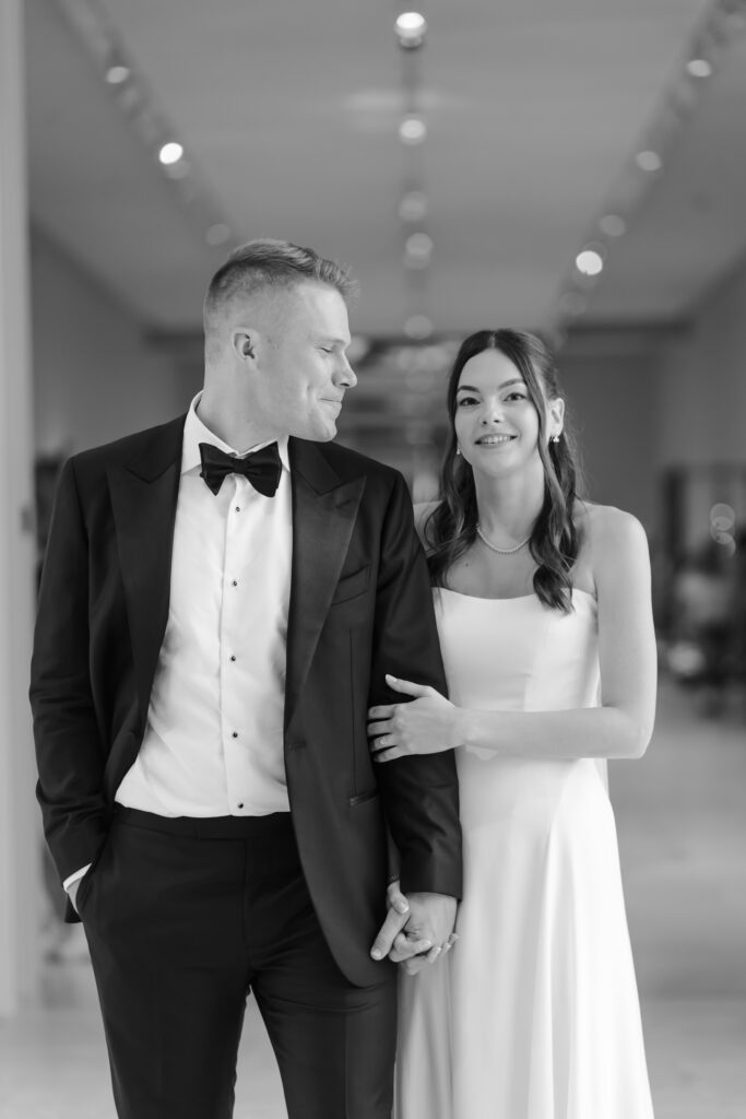 Wedding portraits inside the Art Institute of Chicago during a rainy, intimate Chicago wedding