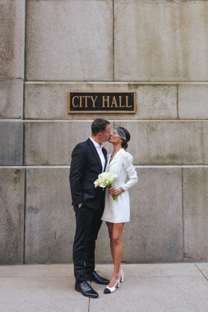 Couple outside Chicago City Hall on their elopement day