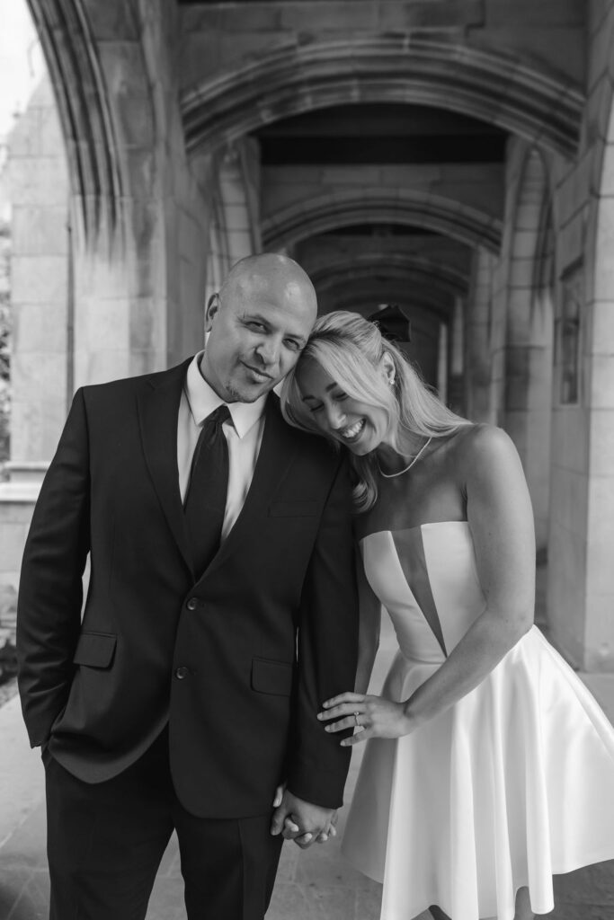 Romantic engagement photo under stone archway at 4th Presbyterian Church, Chicago